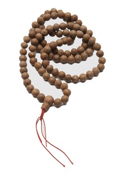 Mala beads are used to create blessings.