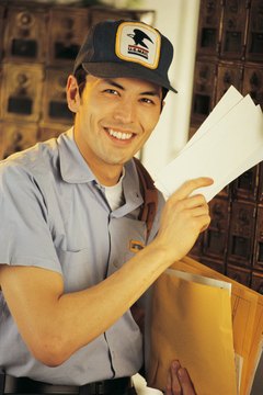 Comstock/Comstock/Getty Images U.S. postal workers appreciate gifts given within specific guidelines.