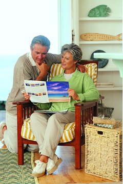 Couple looking at vacation brochures