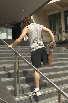 Kane Skennar/Digital Vision/Getty Images The standing thigh stretch can help loosen tight quadriceps.