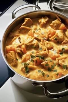 Eising/Photodisc/Getty Images Cayenne and tumeric are frequently used together for curry dishes.