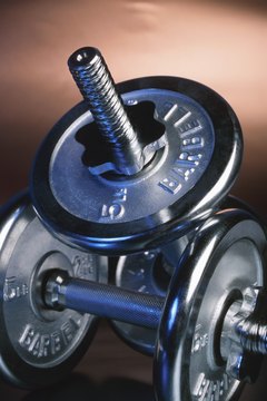 Hemera Technologies/AbleStock.com/Getty Images Weightlifting can be key to improving the efficiency of the muscular system.