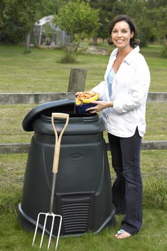 BananaStock/BananaStock/Getty Images Some gardeners prefer to compost fruit peels outdoors to minimize fruit flies.