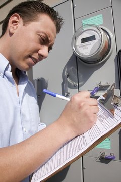 Jupiterimages/liquidlibrary/Getty Images Appraisers take detailed looks at home electric and gas systems.