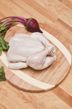 Comstock Images/Comstock/Getty Images Chicken and other meats are highly digestible ingredients.