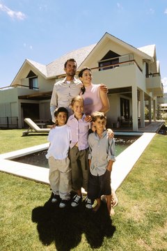Goodshoot/Goodshoot/Getty Images Federal programs can help you keep your house if you are having difficulty paying your mortgage.
