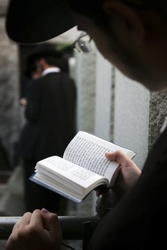 Asking the deceased to intercede in Heaven for those in this world.