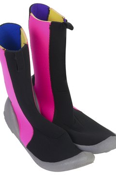 Hemera Technologies/PhotoObjects.net/Getty Images Wear water shoes to protect your feet during the plunge.