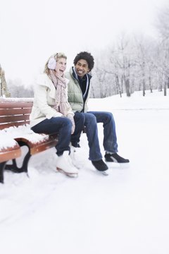 Jupiterimages/Brand X Pictures/Getty Images Tie your skates tightly to avoid ankle wobble.