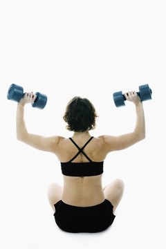 Brand X Pictures/Brand X Pictures/Getty Images Shoulder press primarily targets your deltoids.