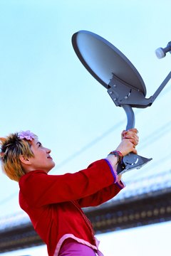 Creatas/Creatas/Getty Images A satellite dish can become a liability if you don't prepare.