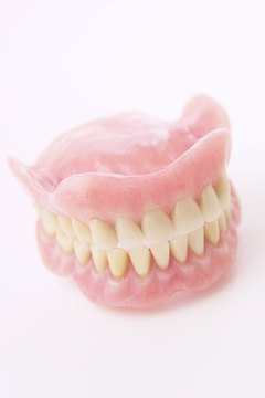 Hemera Technologies/AbleStock.com/Getty Images Forensic odontologists are usually also practicing dentists.