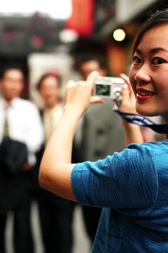 Jupiterimages/Photos.com/Getty Images It's unprofessional to snap photos of co-workers without their permission and could be considered harassment.