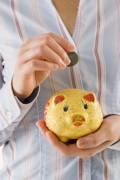 Jupiterimages/Polka Dot/Getty Images Bank MMAs and money market mutual funds pay more interest than a piggy bank.