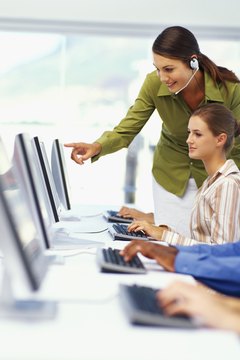 George Doyle/Stockbyte/Getty Images If the job candidate does actual work, she should get paid.