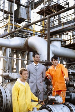 male engineer and a mechanic standing in a power station