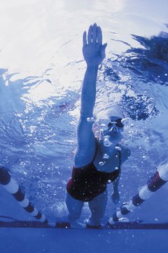 Comstock/Comstock/Getty Images Core muscles are the secret to better swim times.