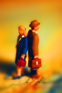 John Foxx/Stockbyte/Getty Images Merging households and finances is a big step.