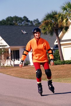 John Foxx/Stockbyte/Getty Images A helmet and other protective gear will help reduce the risk of injury when attempting to learn new skills.