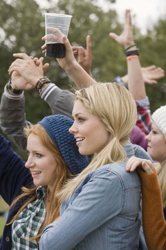 Jupiterimages/BananaStock/Getty Images Social psychologists study how people interact with each other.