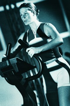 Stockbyte/Stockbyte/Getty Images The stairclimber burns more calories than jogging or walking.