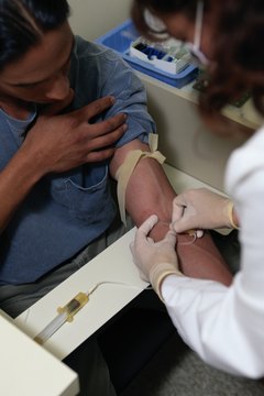 Keith Brofsky/Photodisc/Getty Images Cholesterol testing should be done once every five years.