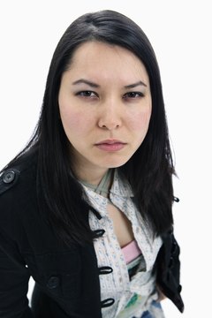 Jupiterimages/Brand X Pictures/Getty Images Facial expressions can convey attitudes and emotions without a word being said.