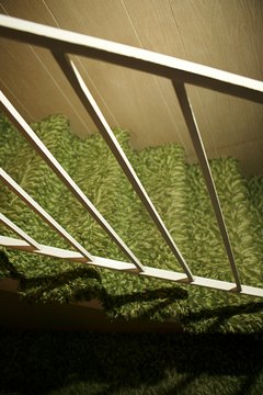Jupiterimages/Comstock/Getty Images If your landlord installs new carpet, he might raise your rent.