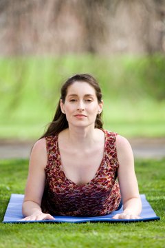 Jupiterimages/Photos.com/Getty Images Gentle yoga poses can help with many types of back pain.