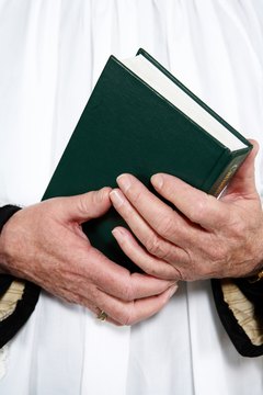 White vestments are becoming more common in Catholic funeral masses.