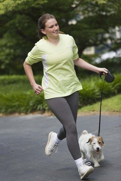 Jupiterimages/Comstock/Getty Images Hitting the track before work will keep him happy and your buns looking glorious.