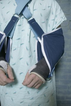 Brand X Pictures/Brand X Pictures/Getty Images An injury at work can interfere with your ability to do your job.