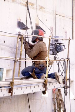 Jupiterimages/Photos.com/Getty Images OSHA helps keep the workplace safe for employees.