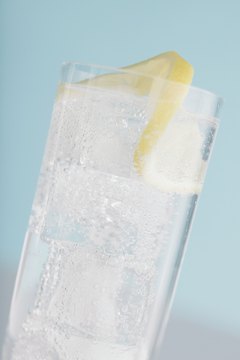 Comstock/Comstock/Getty Images Adding lemon to your water boosts your vitamin C intake.