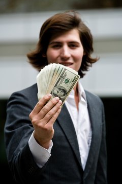 Jupiterimages/Photos.com/Getty Images A split annuity allows you to invest your money and receive an income at the same time.