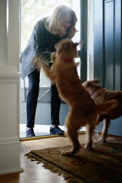 Ryan McVay/Photodisc/Getty Images Avoid reinforcing hyper behavior with attention.