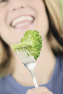Comstock/Comstock/Getty Images Broccoli adds carbs to your diet, but not a lot.