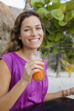 Jupiterimages/Creatas/Getty Images Enjoy a cup of 100 percent juice for half of the daily fruit recommendation.