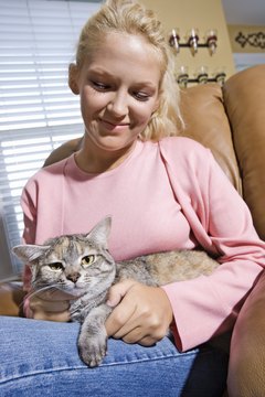 Jupiterimages/Comstock/Getty Images She might not let anyone near you when a seizure is ahead.