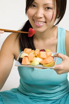Creatas/Creatas/Getty Images Bolster your recommended fruit servings by having fruit for dessert.