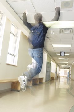 Although this student may be breaking the rules by running in the hall, a principal does not the right to search his backpack.
