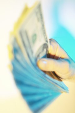Dynamic Graphics Group/Dynamic Graphics Group/Getty Images Car titles loans can provide fast cash.