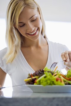Jupiterimages/Pixland/Getty Images Get your diet right to gain your curves.