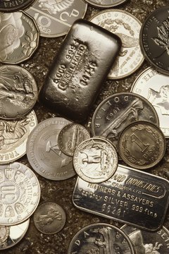 Jupiterimages/Photos.com/Getty Images You may have to pay state inheritance taxes if you inherit a coin collection.