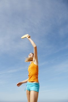 IT Stock/Polka Dot/Getty Images Use a paddle, not a racket, to play paddle tennis.