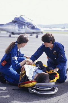 Keith Brofsky/Digital Vision/Getty Images Flight nurses earn similar salaries to RNs.
