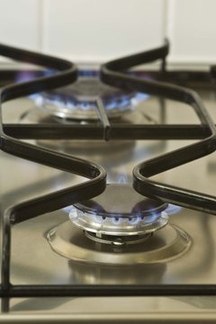 Jupiterimages/Comstock/Getty Images There are numerous physical and financial contracts between natural gas producer and end user.