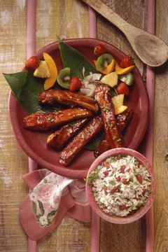 Jupiterimages/Comstock/Getty Images Pork ribs get most of their calorie content from fat.