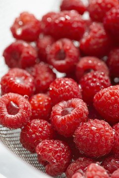 Jupiterimages/Photos.com/Getty Images Real raspberries boost the nutrients in raspberry tea.
