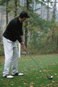 Maintain good posture and alignment for a successful fairway wood shot.